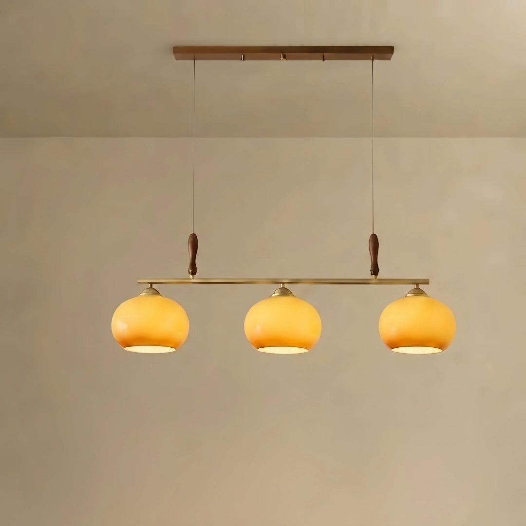 Modern Pendant Lamp — Amber Glass Shades & Brass Bar Wood Accent for Dining